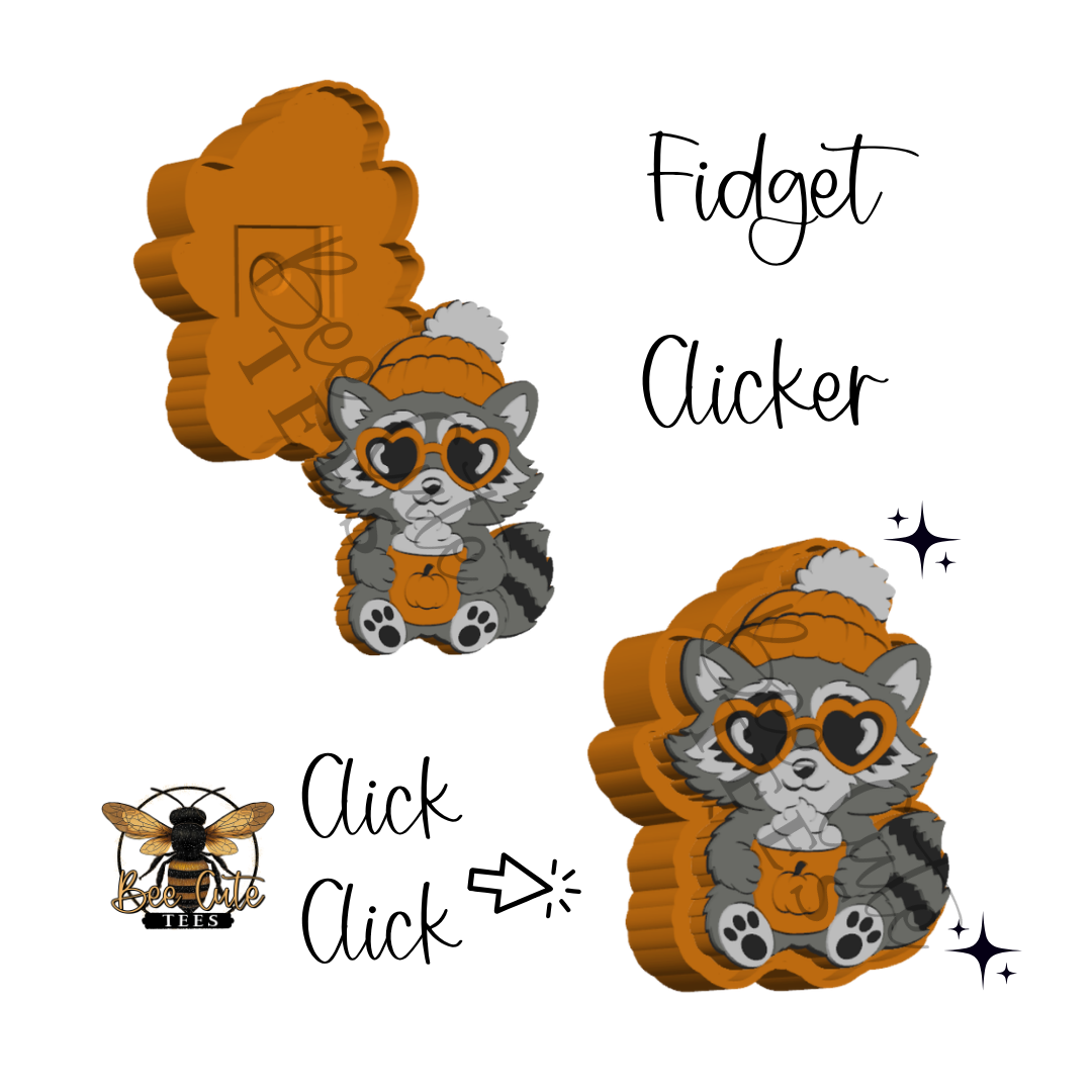 Digital preview of a fidget clicker featuring a cute cartoon raccoon wearing heart-shaped sunglasses and an orange beanie, shown alongside a bee graphic and the words 'Fidget Clicker' and 'Click Click' on a plain white background.