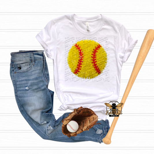 White t-shirt with yellow softball graphic, blue jeans, baseball glove, and bat on a white background