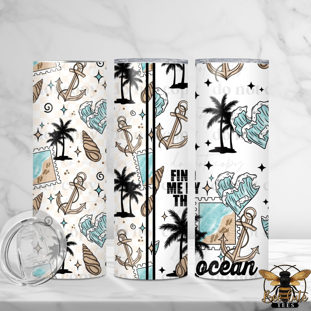 Three tumblers with beach-themed designs featuring palm trees, anchors, and ocean waves on a white background.