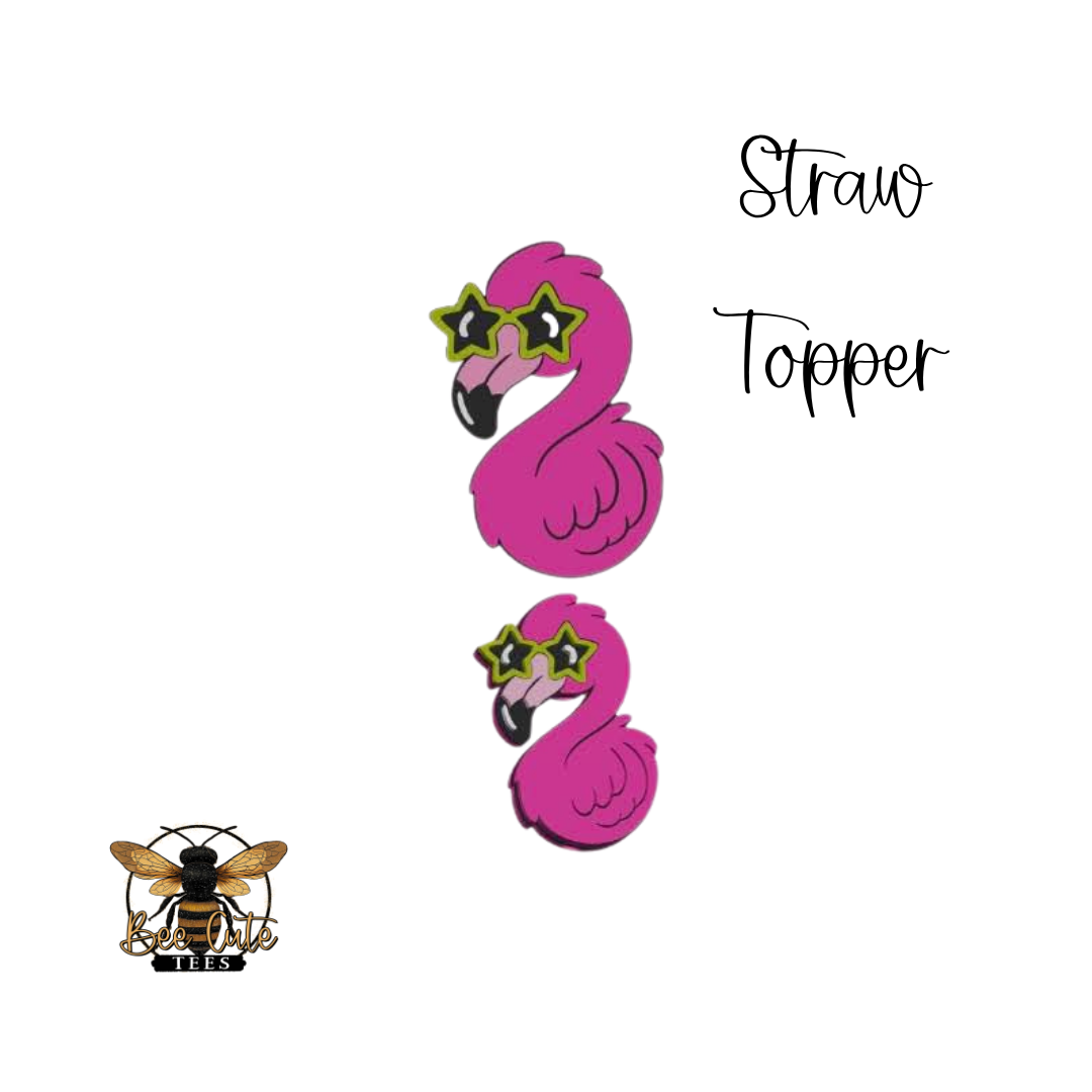 Two pink flamingo straw toppers with star-shaped sunglasses on a white background.