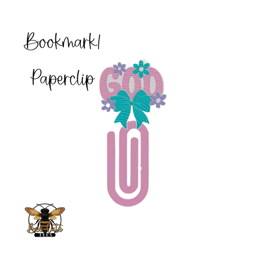 Decorative paperclip with flowers and a bow labeled 'Bookmark Paperclip' on a white background.