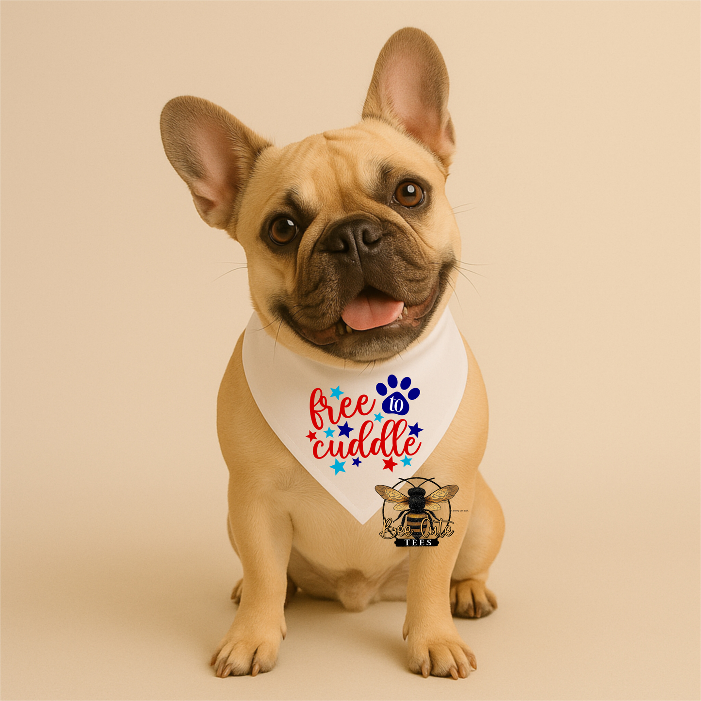 Dog wearing a bandana with 'free to cuddle' text and bee design on a beige background