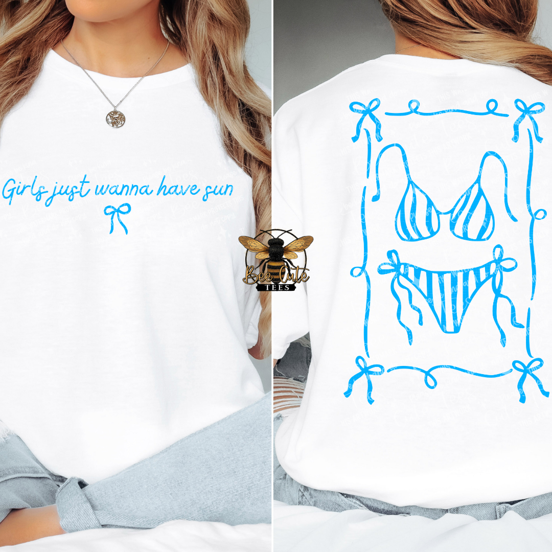 White t-shirt with blue text and graphics on a person wearing it.