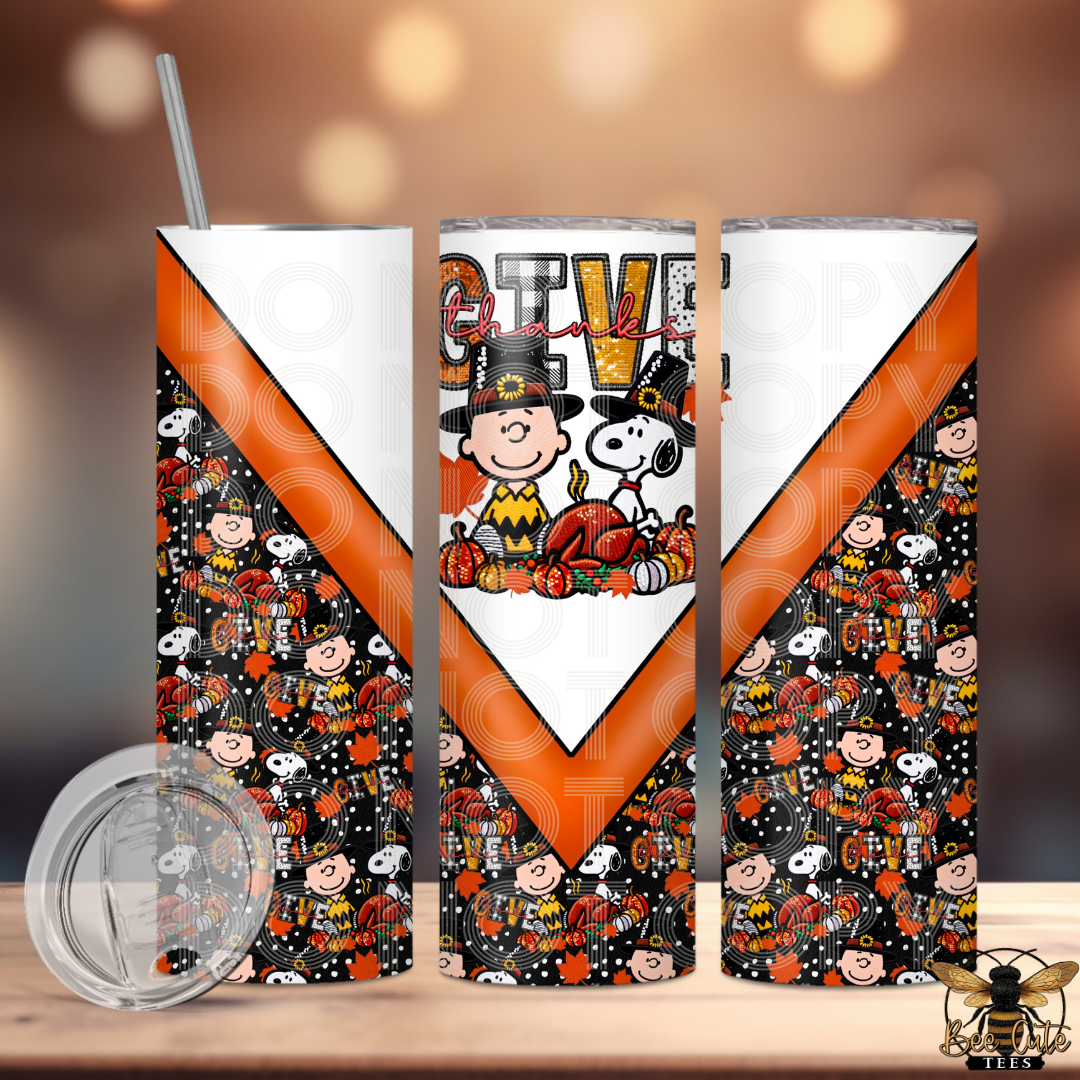 Three views of a skinny tumbler with a Thanksgiving-themed print, featuring pumpkins, and a Thanksgiving turkey. The design has a white V-shaped top section with 'GIVE THANKS' text, an orange diagonal stripe, and a black bottom section covered in small character illustrations.