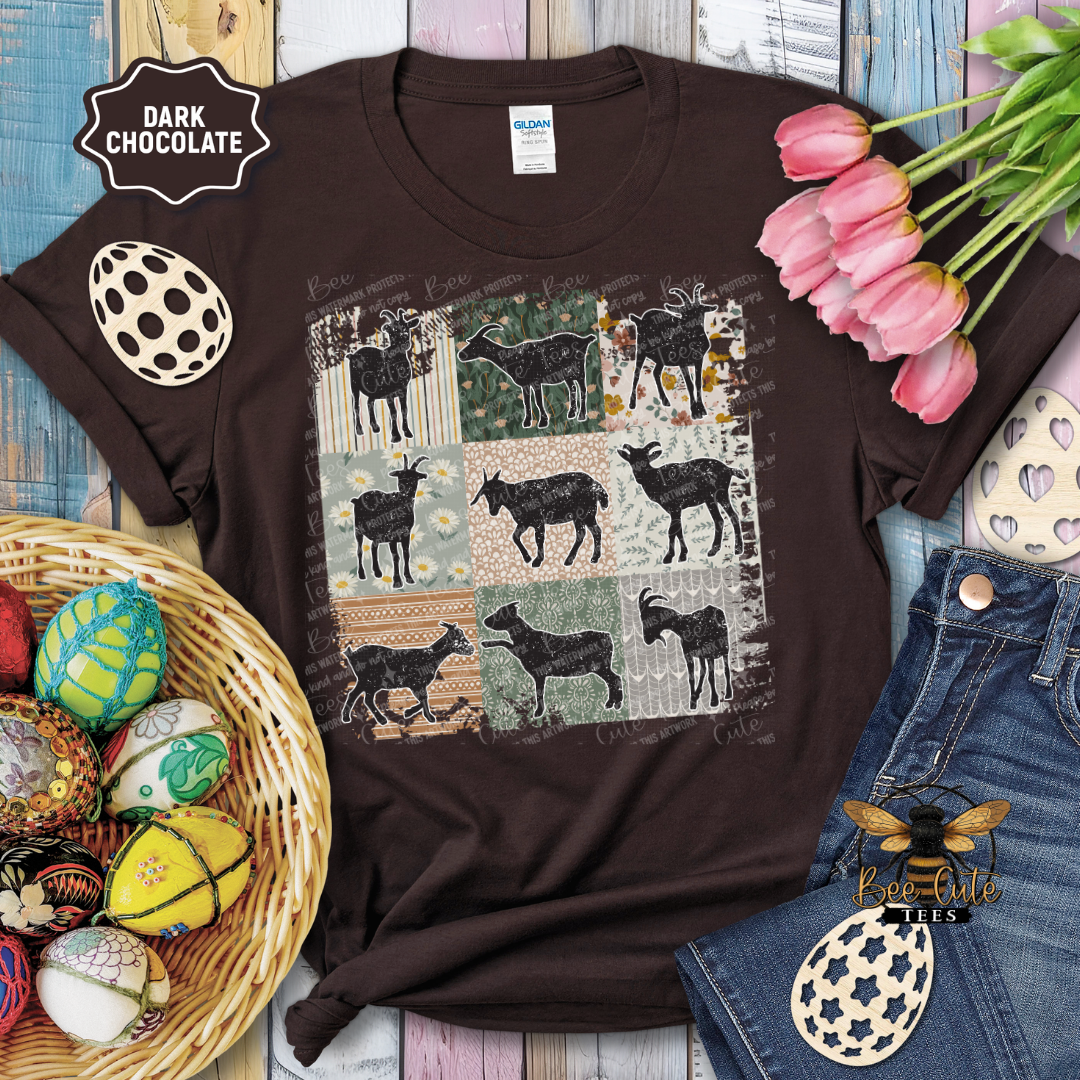 Brown t-shirt with deer pattern on a wooden surface with decorative items.