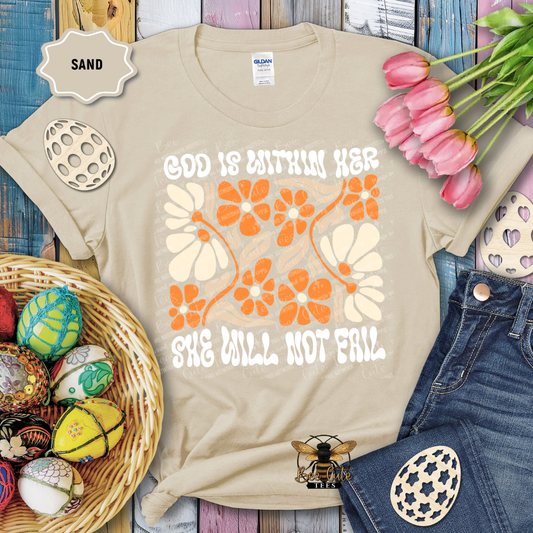 Beige t-shirt with floral design and text on a wooden surface with Easter decorations.