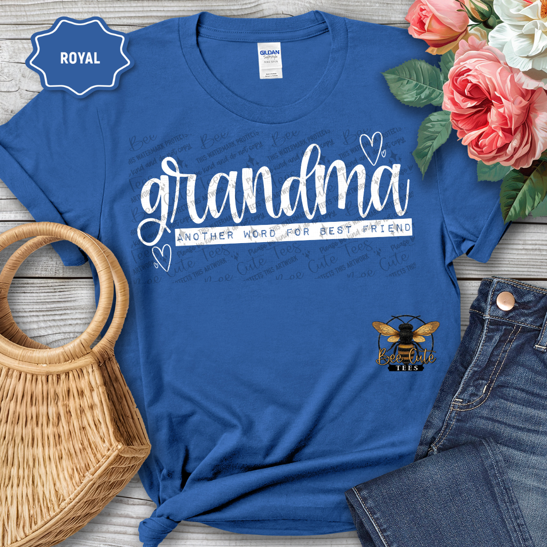 Blue t-shirt with 'grandma another word for best friend' text and bee logo, surrounded by flowers and jeans.