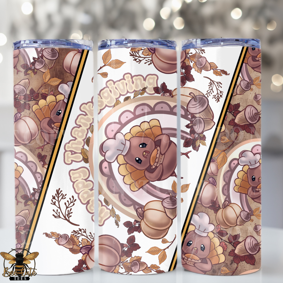 Three slim tumblers with a Thanksgiving-themed wrap design, featuring cartoon turkeys, acorns, pumpkins, and the word 'Thanksgiving' in warm autumn colors on a white background.