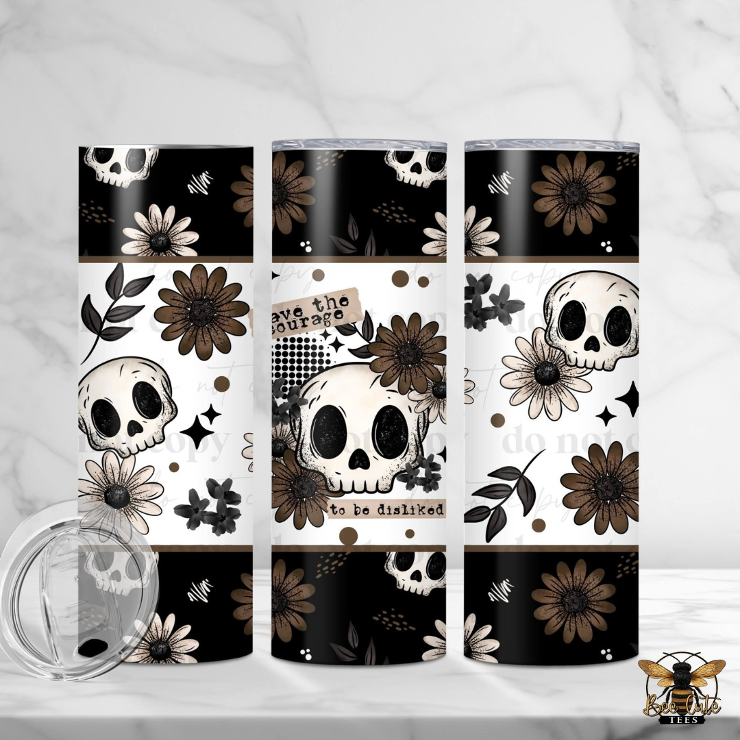 Set of tumblers with skull and floral designs on a white background