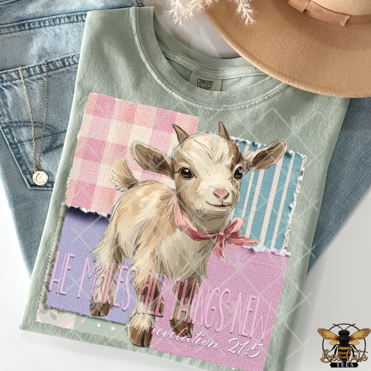 T-shirt with a goat graphic and text on a denim background