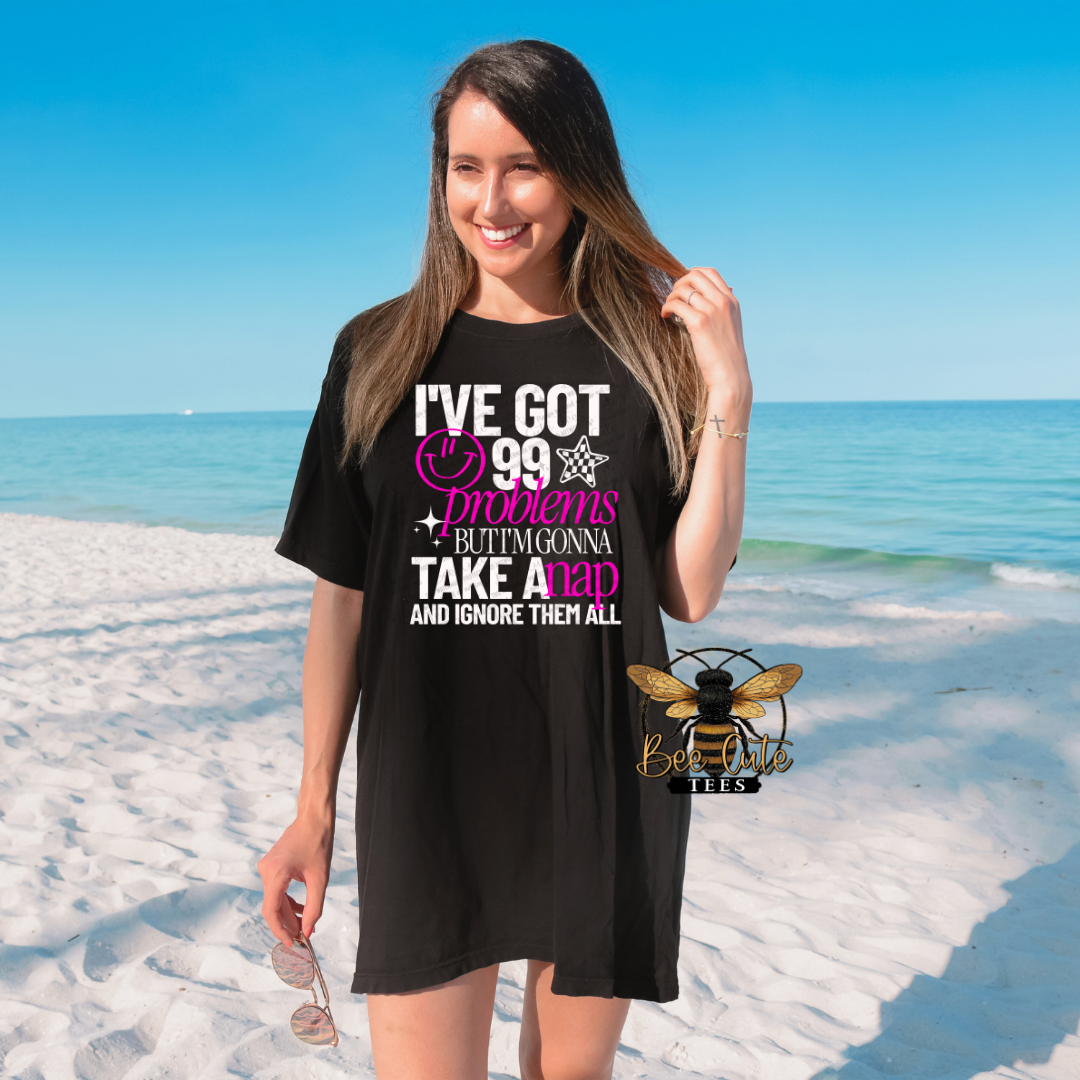 Woman wearing a black t-shirt with a humorous quote on a beach