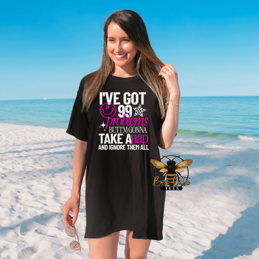 Woman wearing a black t-shirt with a humorous quote on a beach
