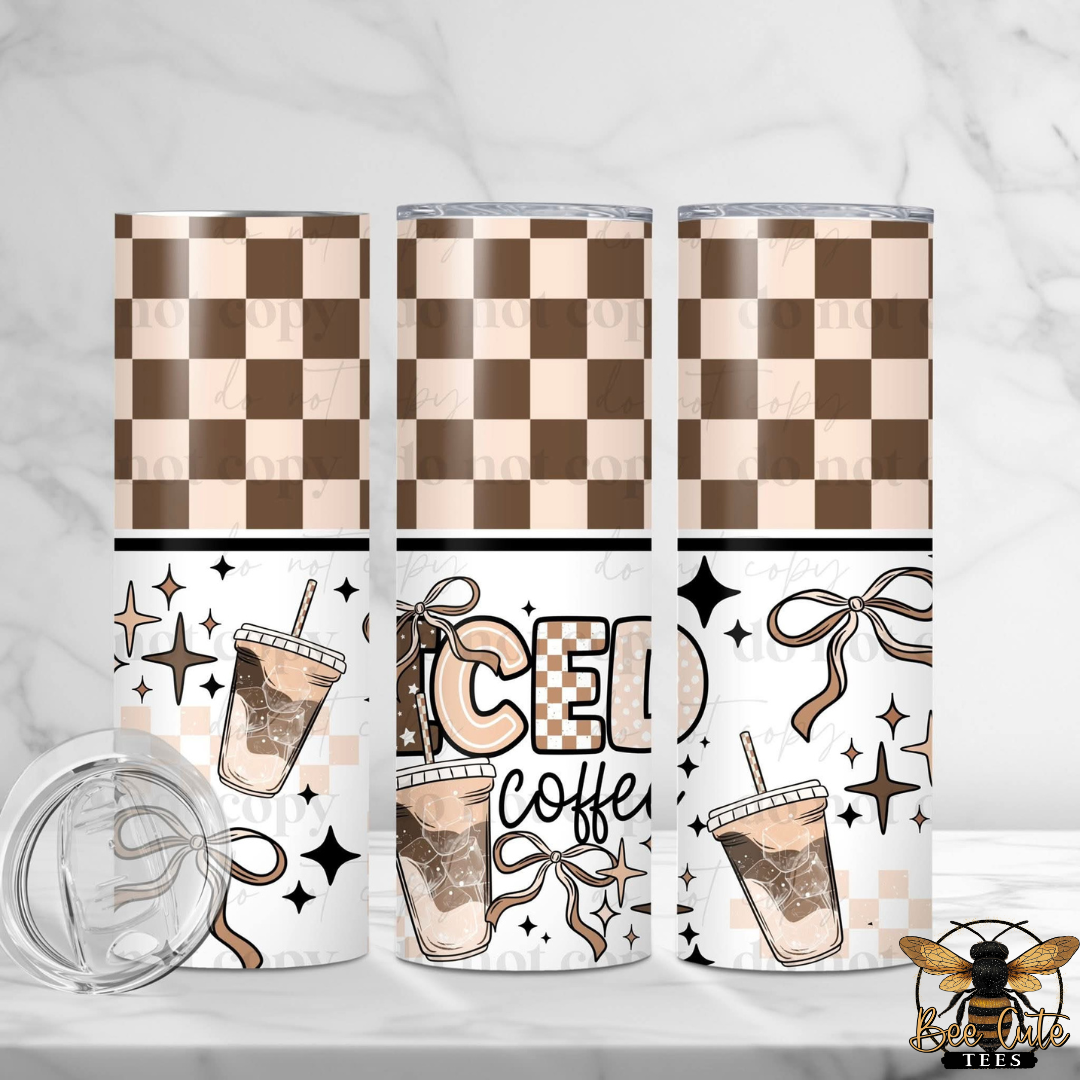Three tumblers with checkered pattern, iced coffee design, and decorative elements on a white background.