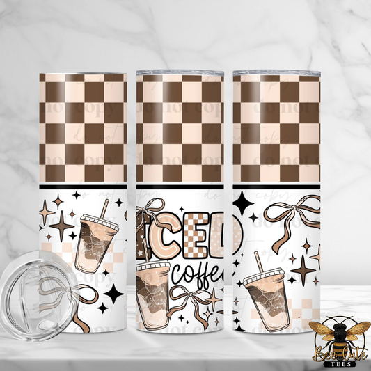 Three tumblers with checkered pattern, iced coffee design, and decorative elements on a white background.