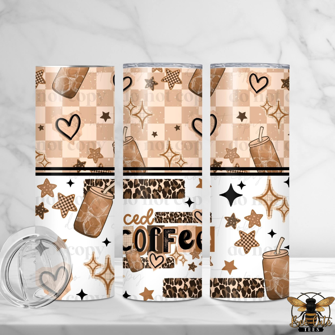 Three patterned tumblers with coffee-themed designs on a white background