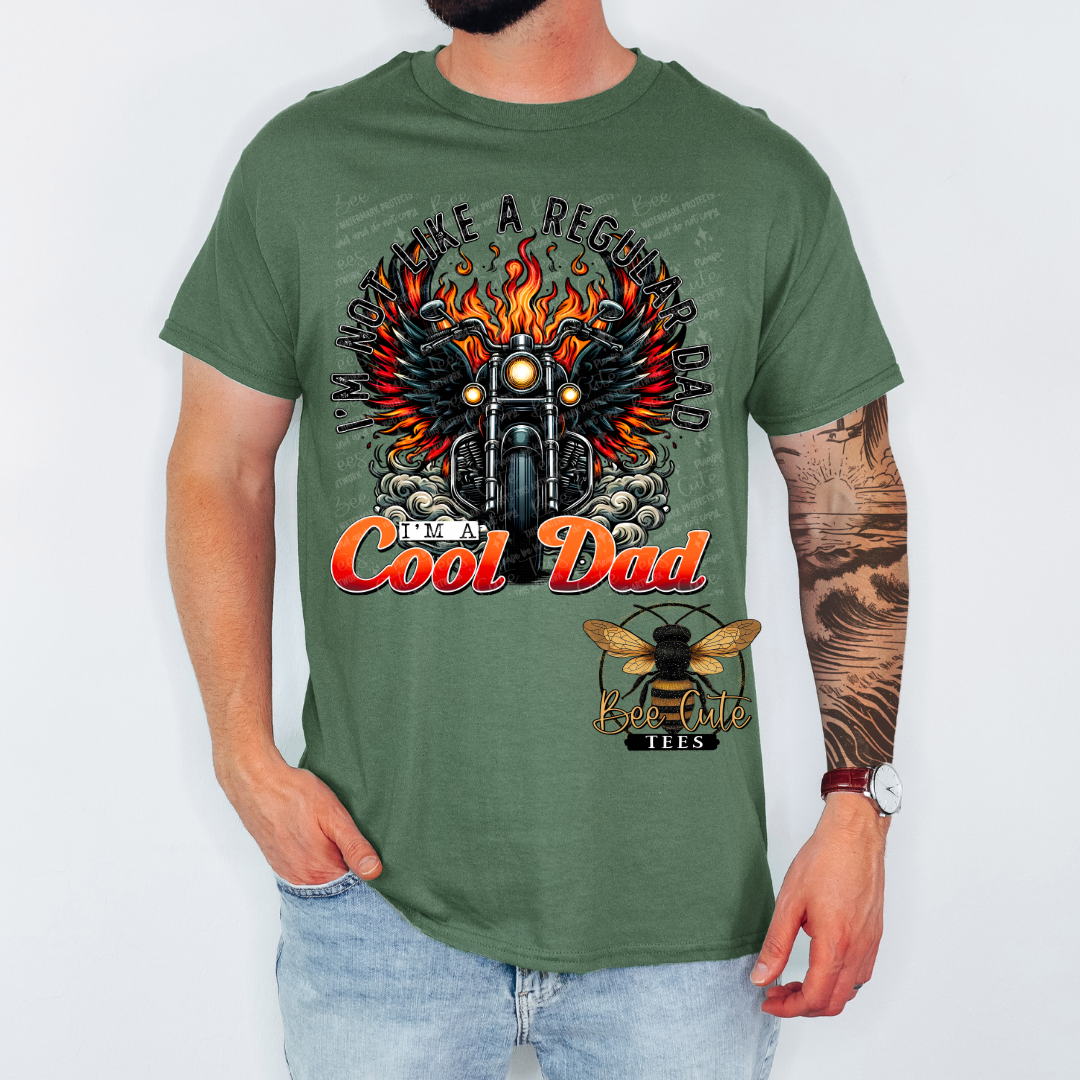 Person wearing a green t-shirt with a motorcycle graphic and text on a white background