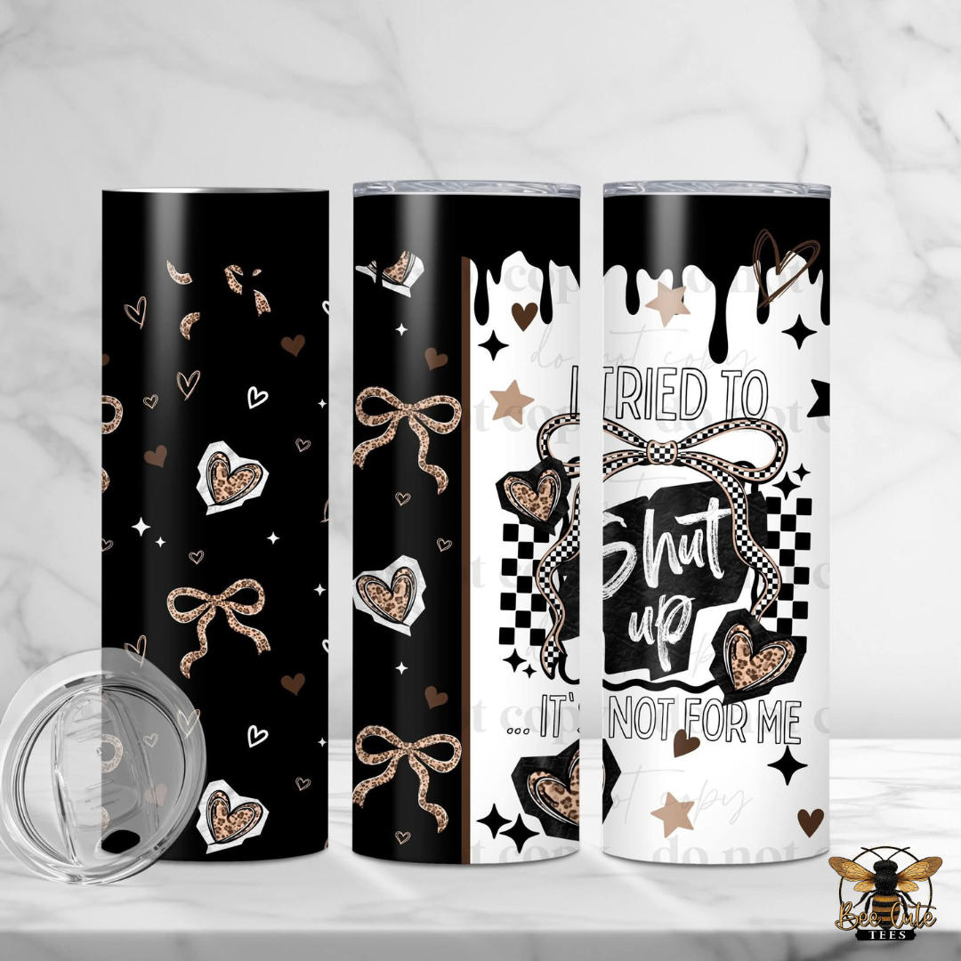 Three tumblers with different designs on a white background