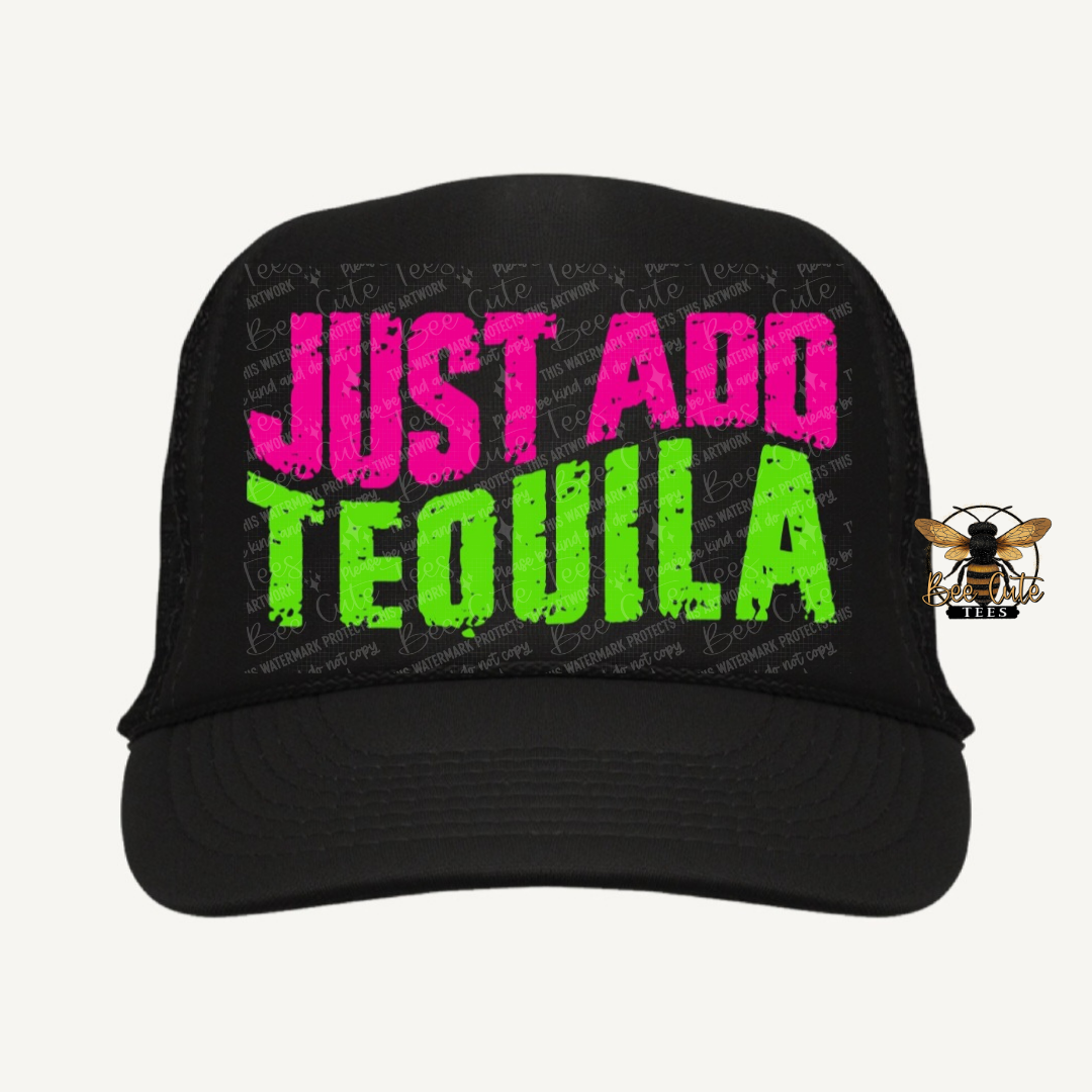 Black cap with pink and green text 'JUST ADD TEQUILA' on a white background
