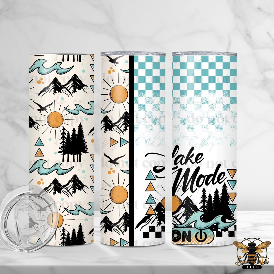 Three tumblers with different designs on a white background