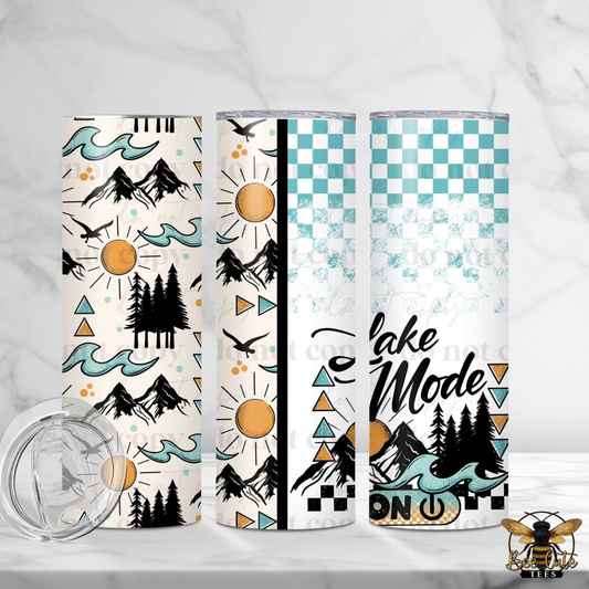 Three tumblers with different designs on a white background
