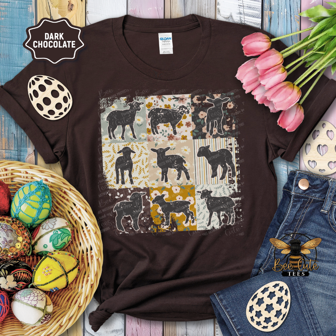 Brown t-shirt with sheep pattern on a wooden surface with Easter decorations