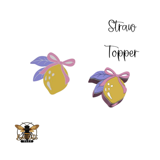 Two lemon-shaped straw toppers with colorful bows on a white background, featuring the brand 'Bee's'.