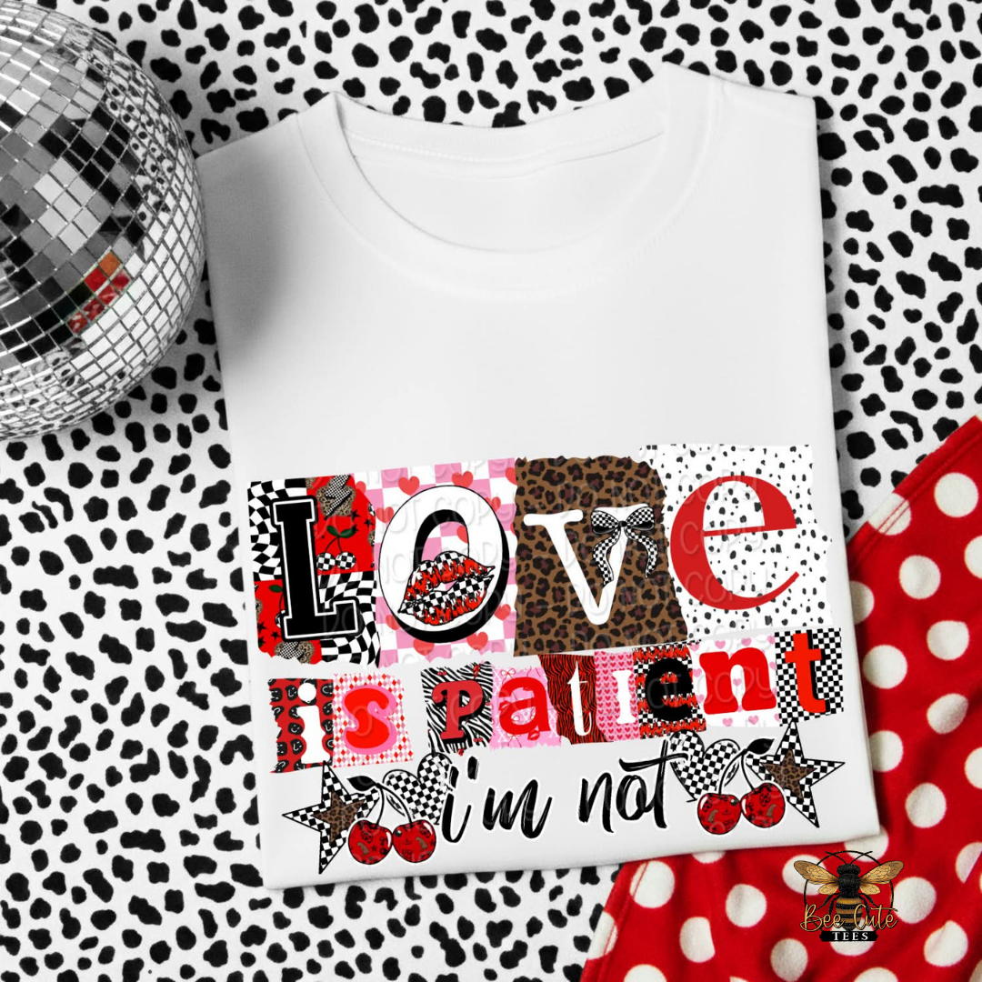 White t-shirt with colorful text design on a patterned background