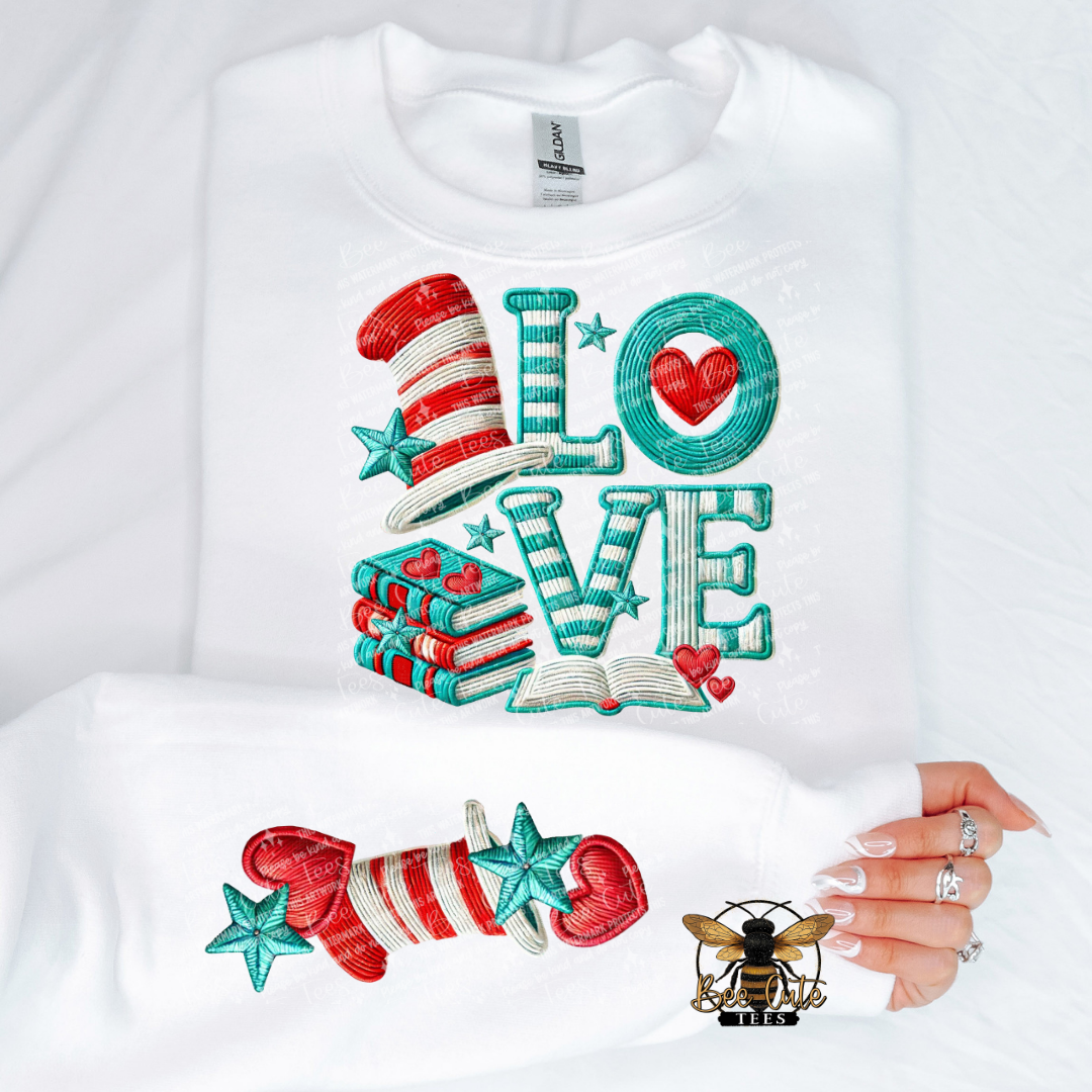 White sweatshirt with colorful 'LOVE' design  on a white background.