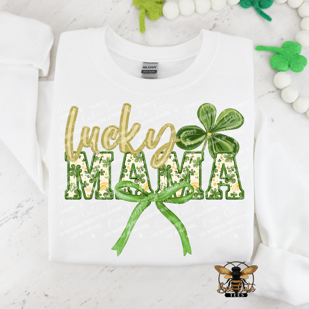 White sweatshirt with 'lucky MAMA' text and shamrock design on a white background