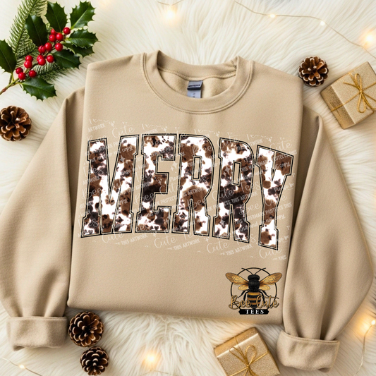 Beige sweatshirt with 'MERRY' design on a festive background with holly and pine cones.
