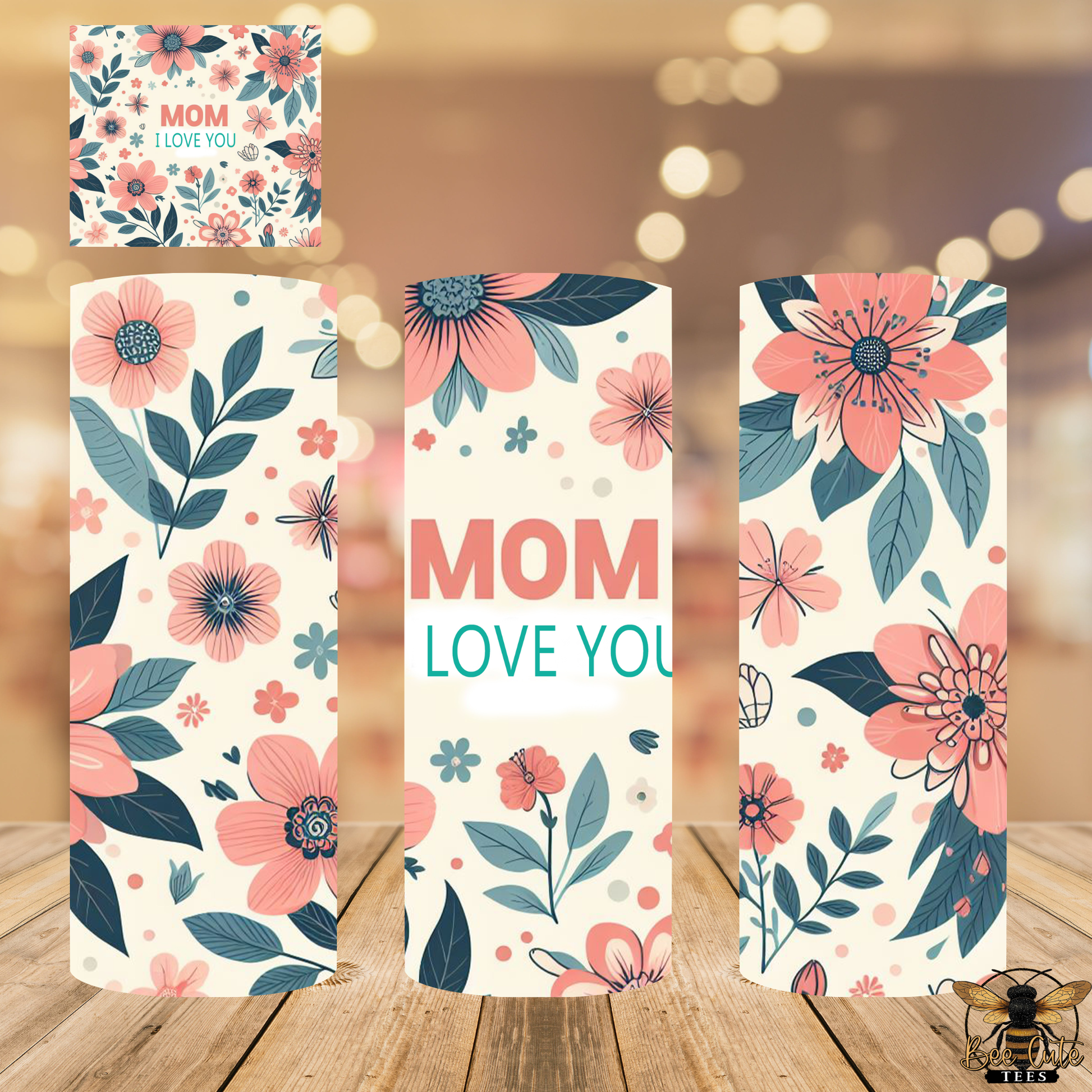 Floral cards with 'Mom I love you' text on a wooden surface.