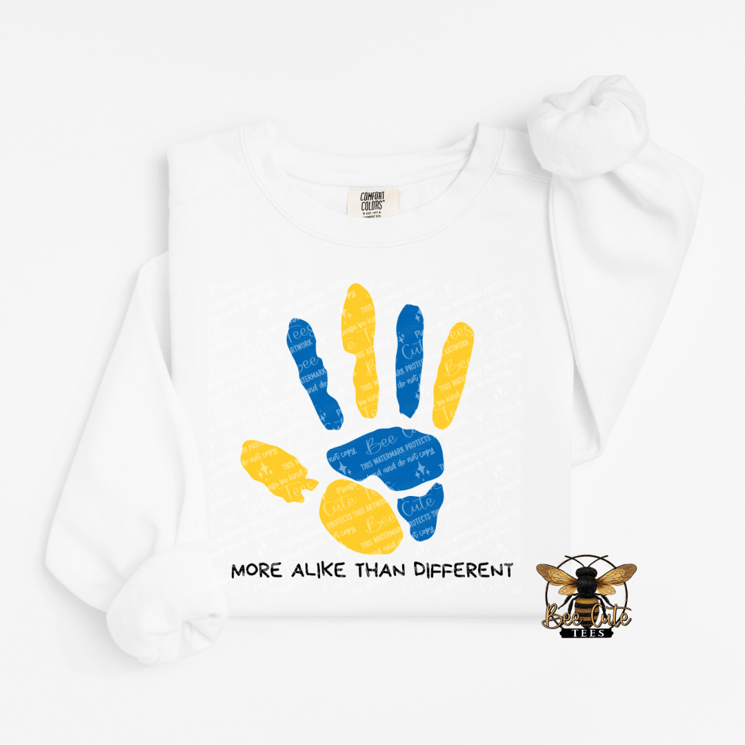 White sweatshirt with colorful handprints and text on a white background