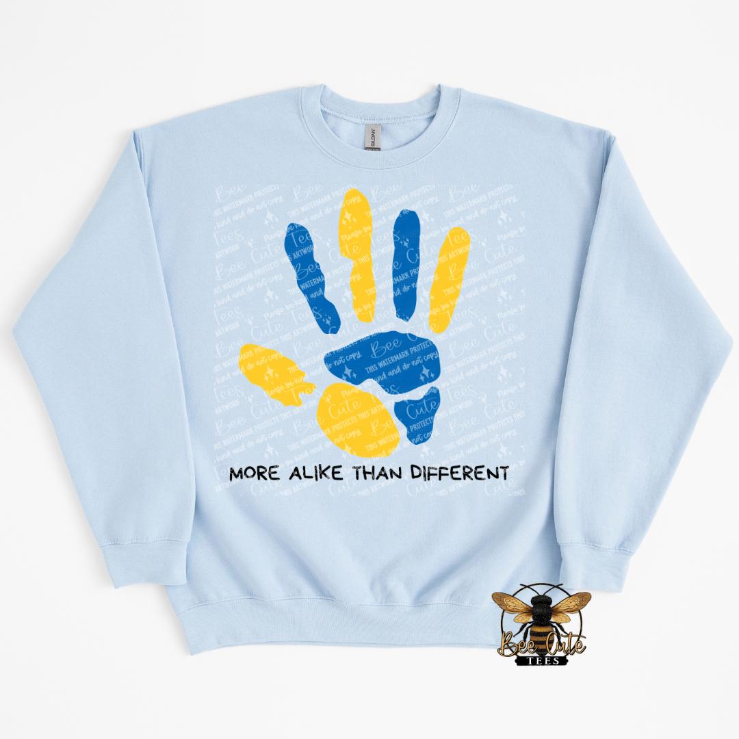 Light blue sweatshirt with colorful handprints and text on a white background