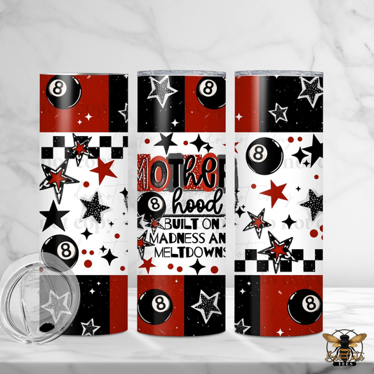 Three tumblers with a black, red, and white pattern featuring numbers and stars on a white background.