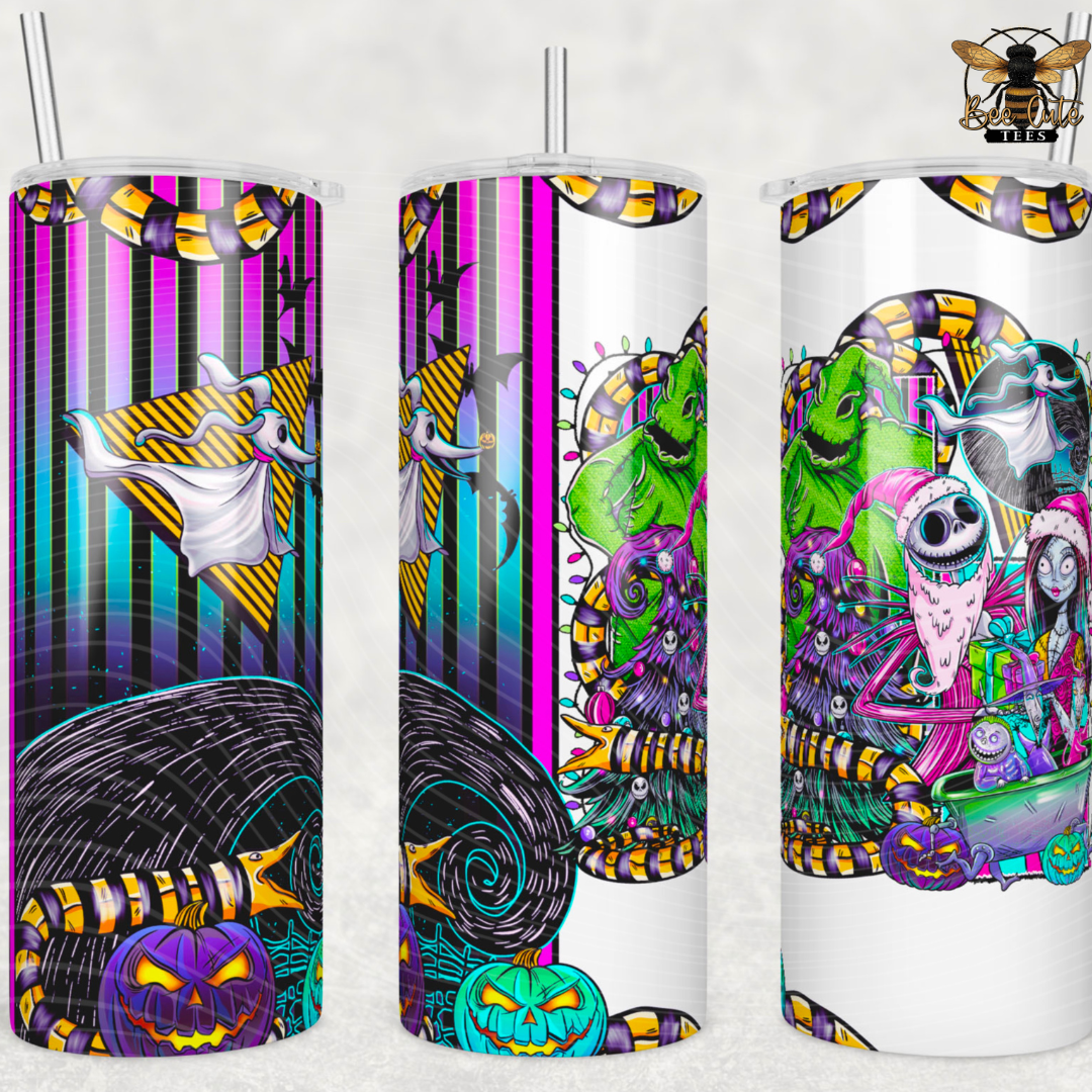 Three colorful tumblers with Halloween-themed designs on a white background