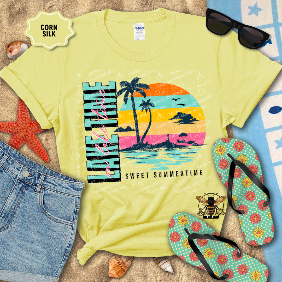 Yellow t-shirt with a beach-themed design, sunglasses, flip-flops, and denim shorts on a sandy background.