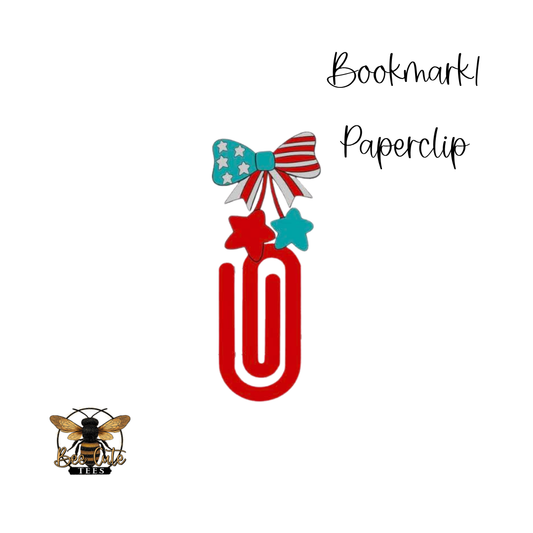Red paperclip with a blue and red bow on a white background, labeled 'Bookmark Paperclip'.