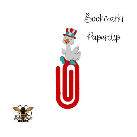 Red paperclip with a cartoon duck wearing a hat on a white background, labeled 'Bookmark Paperclip'.