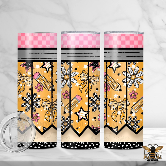 Three tumblers with decorative patterns on a white background