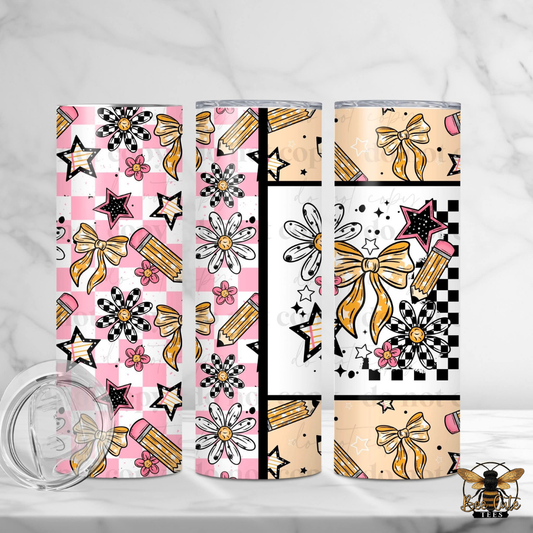 Three tumblers with decorative patterns on a white background