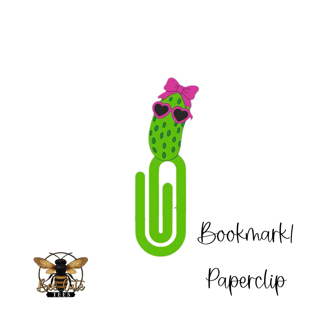 Green paperclip with a pink bow labeled 'Bookmark Paperclip' on a white background