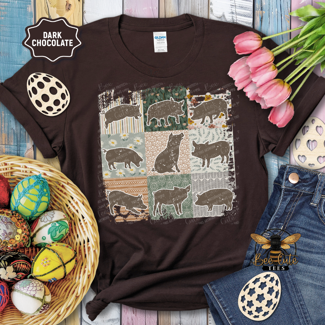 Brown t-shirt with pig pattern on a wooden surface with Easter decorations.