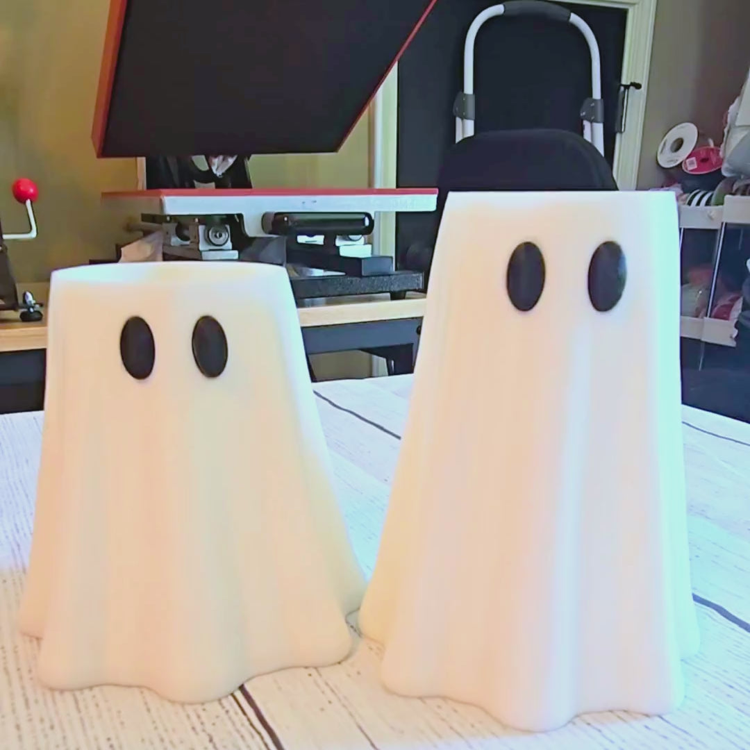 video of how to use two different sized ghost can sleeves. inserting can into sleeves 