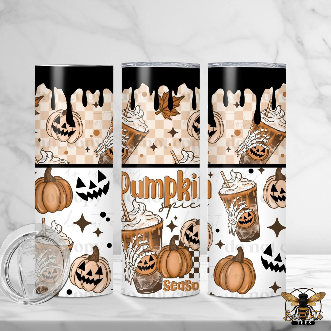 Three insulated tumblers with a Halloween-themed wrap design are displayed on a white marble surface. The design features jack-o'-lanterns, iced coffee cups, ghosts, and the text 'Pumpkin Spice' and 'SeaSon'.