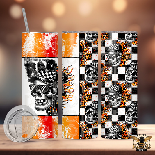 Skateboard with skull design and checkered pattern on a wooden surface.
