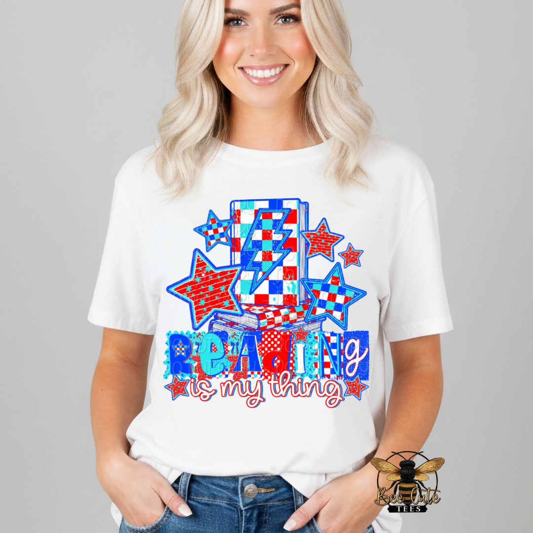 Woman wearing a white t-shirt with colorful graphic design and text on a gray background