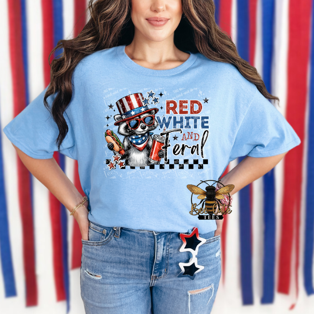 Person wearing a blue t-shirt with a graphic design and text in front of a striped background