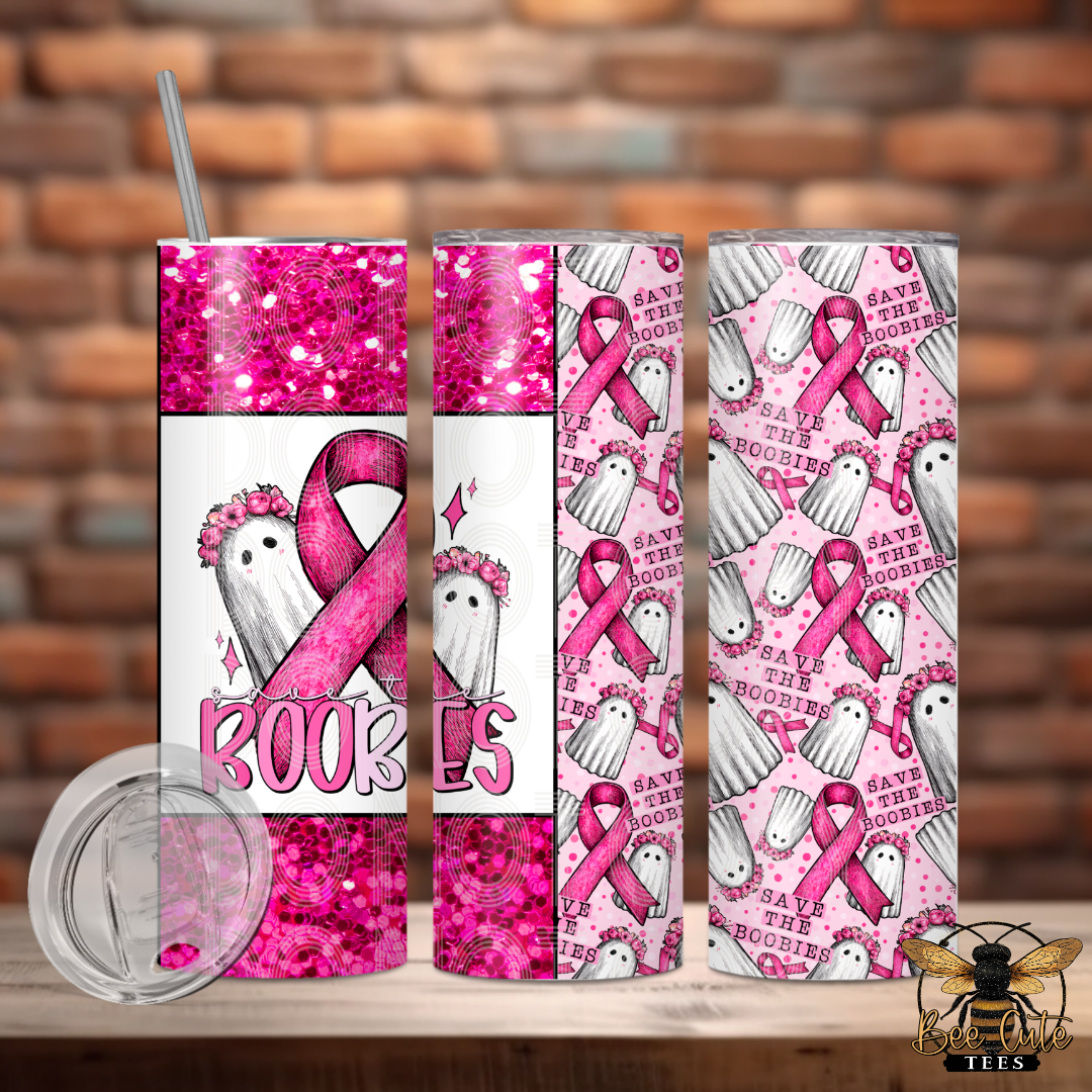 Three views of a pink glitter and patterned tumbler with a clear lid and straw, featuring a pink ribbon, white ghosts, and the text 'Save the Boobies' against a brick wall background.