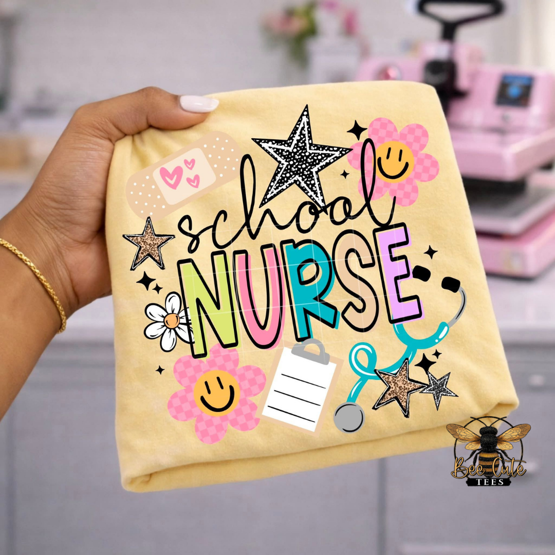 Yellow t-shirt with 'School Nurse' text and graphics held by a hand.
