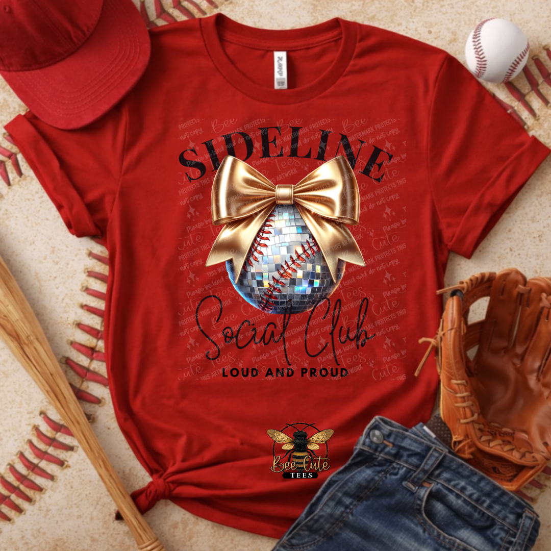 Red t-shirt with 'Sideline Social Club Loud and Proud' design, surrounded by baseball accessories.